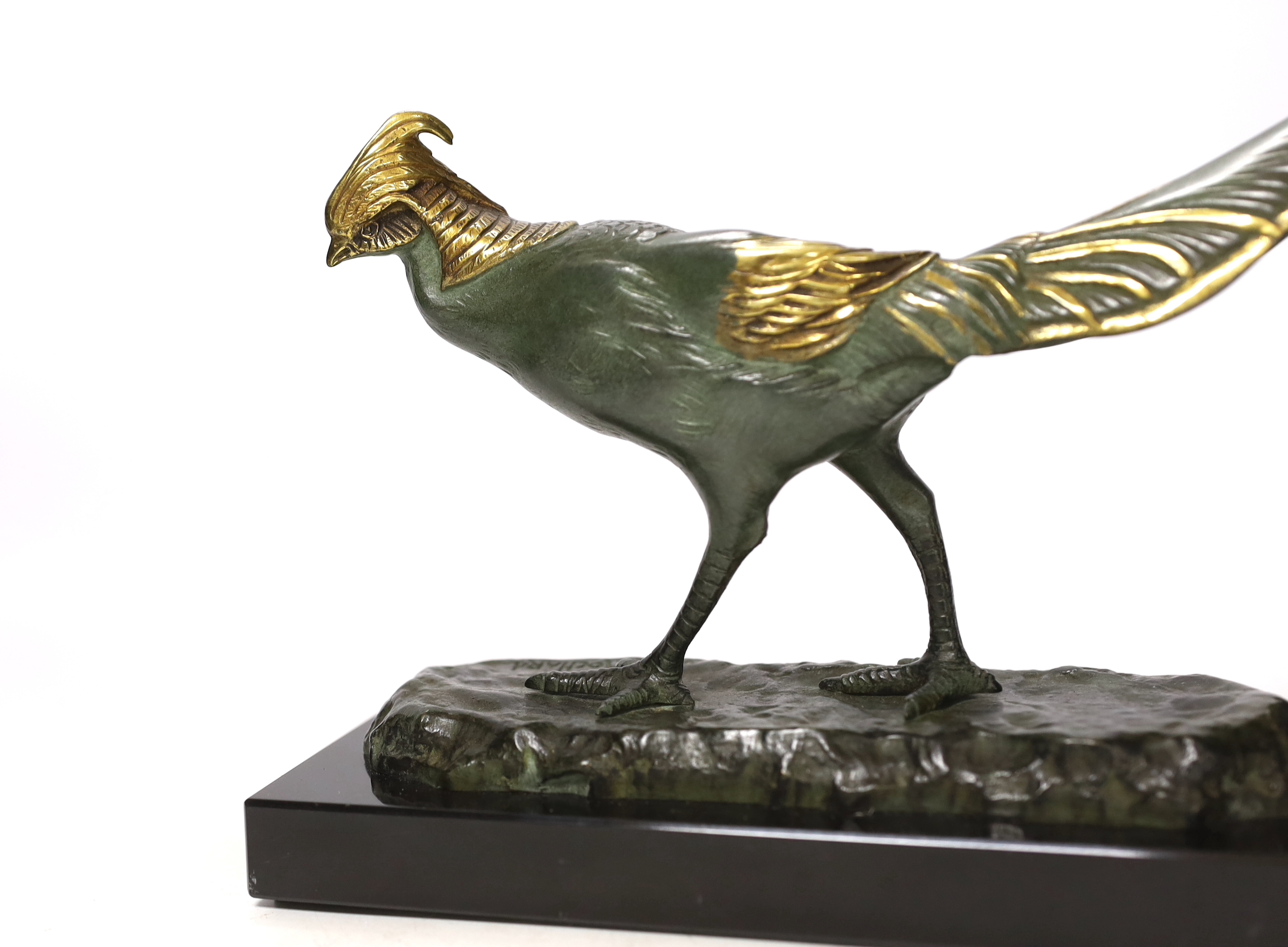 Irénée Rochard (1906-1984), an Art Deco patinated bronze of a pheasant, partially gilt, signed, 36cm wide